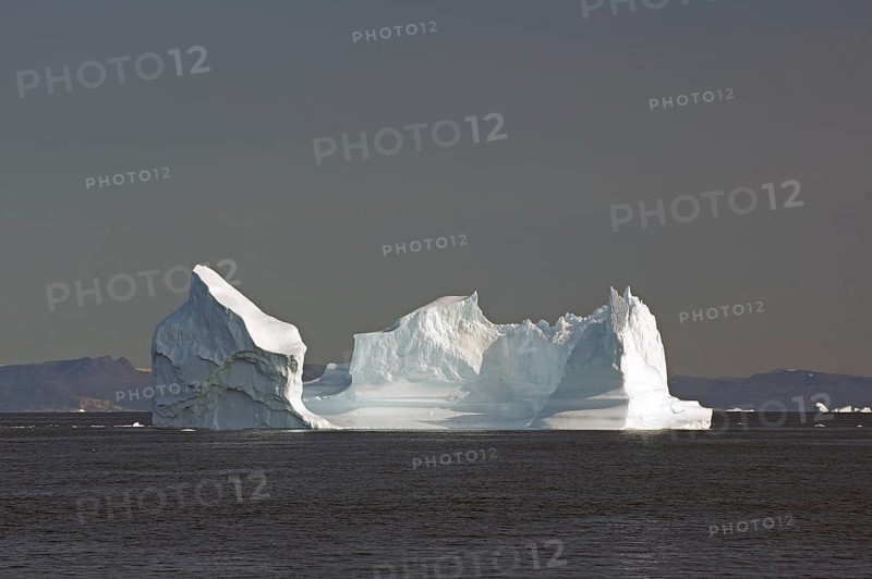Huge icebergs in a wide bay
