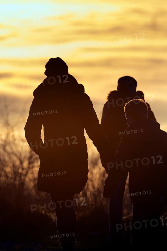 Walkers in the evening sun