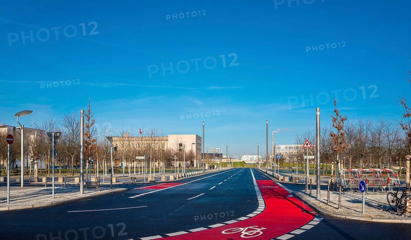 Red marked cycle path at the Federal Chancellery