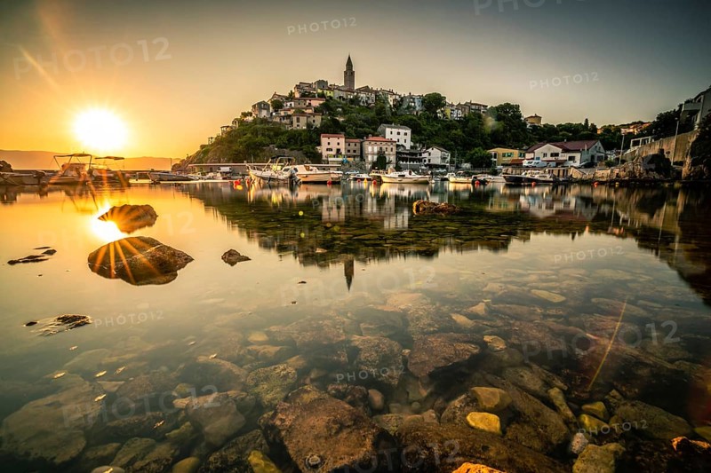 Historical village by the sea. Bay with harbour in the morning