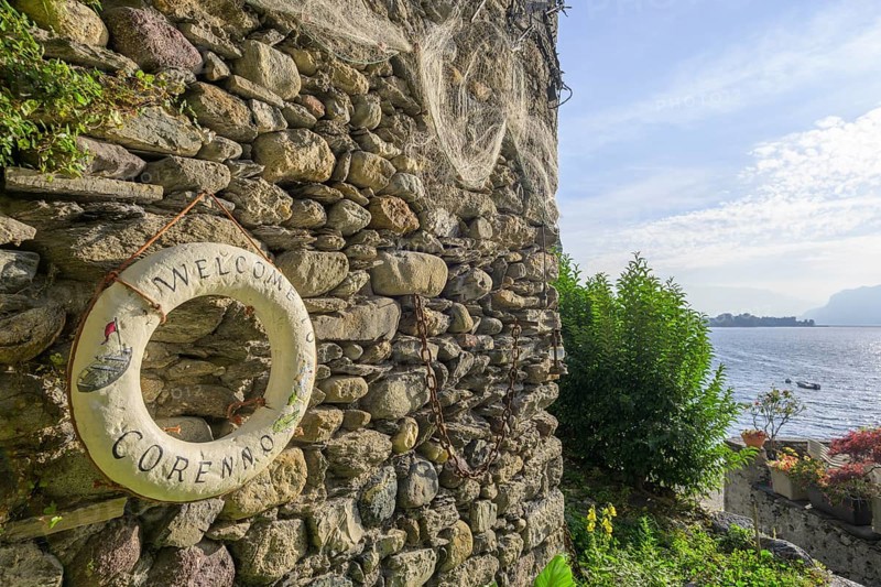 Lifebuoy with inscription Welcome to Corenno