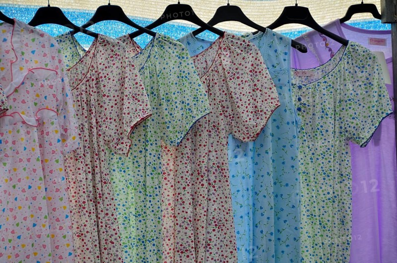Nightdresses on hangers at market