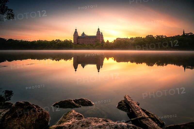 Johannisburg Castle reflected in the Main River
