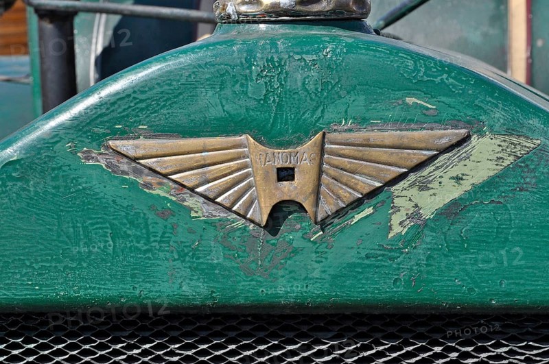 Hanomag logo on green metal from tractor