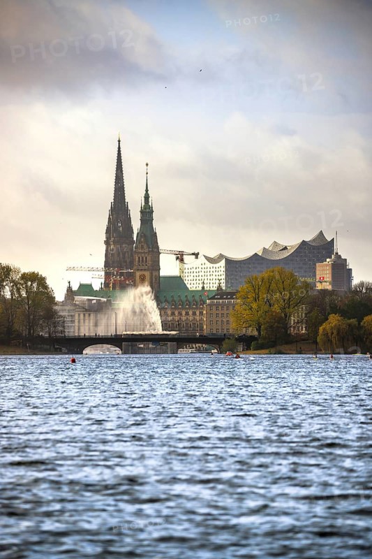 View of the Inner Alster Lake with City Hall church tower and Elbe Philharmonic Hall Hamburg