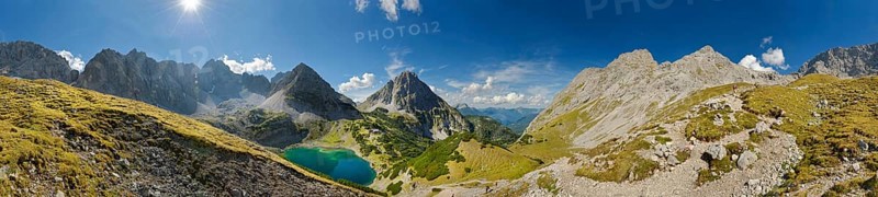 360 mountain panorama above the Drachensee and the Coburger Huette with the mountain peaks of the Sonnenspitze