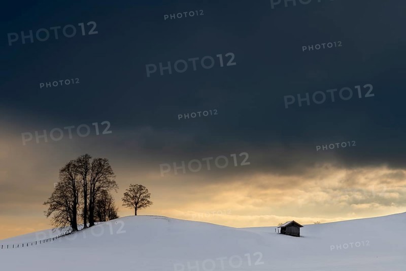 Winter landscape against a dramatic sky