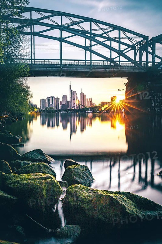 View under a railway bridge over the river Main