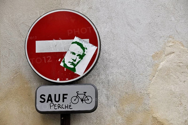 Stickered traffic sign Transit prohibited except for cyclists