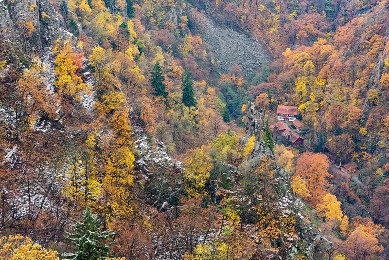 First snow on the autumnal slopes of the Bode Valley in the Harz Mountains