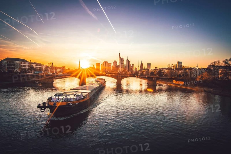 View from the Floeserbruecke over the river Main with container ship