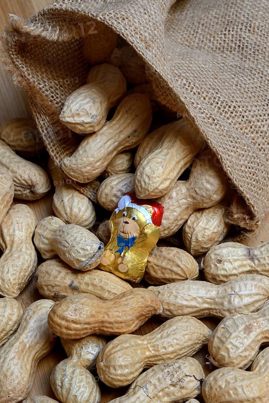 Peanuts and chocolate figure in sack