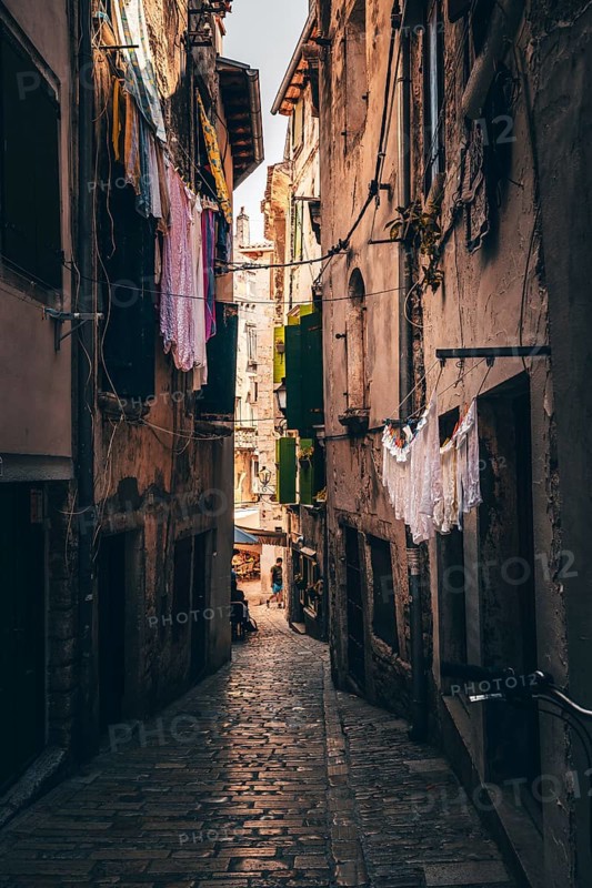 Laundry drying on the line in an alley in the old town