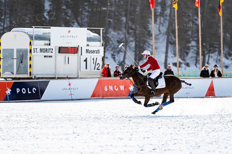 Robert Strom of Team St. Moritz rides across the field in full gallop