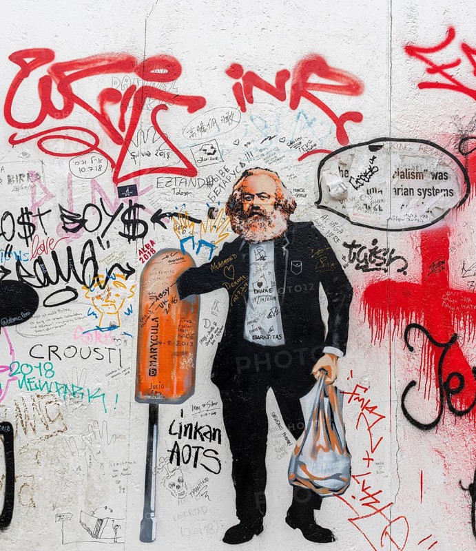 Karl Marx caricature on the wall of the East Side Gallery