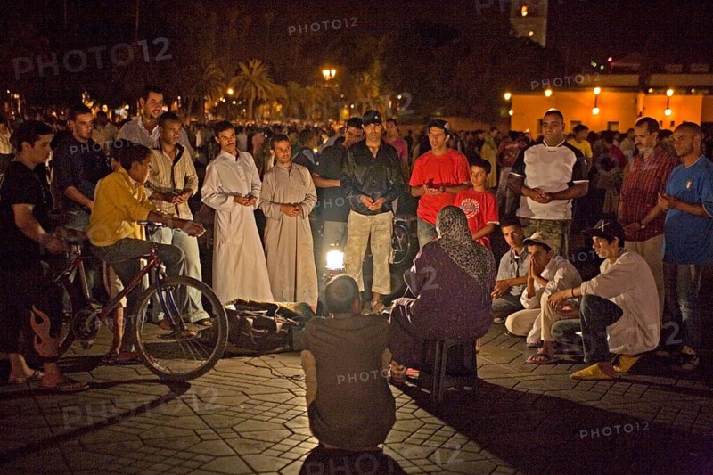 Storyteller in front of an eager audience