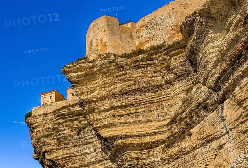 Steep coast of Bonifacio with old town on a limestone plateau