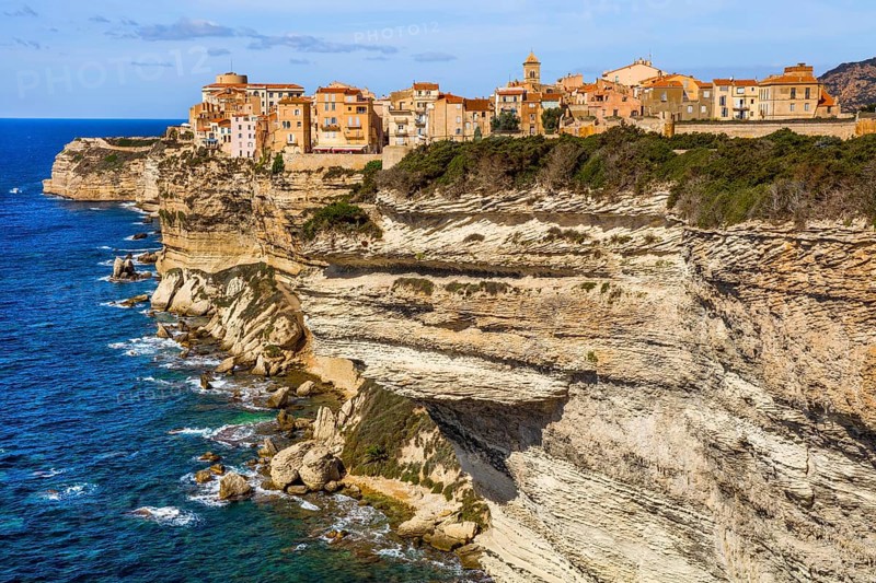 Steep coast of Bonifacio with old town on a limestone plateau