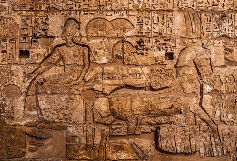 In front of Ramses III in the chariot