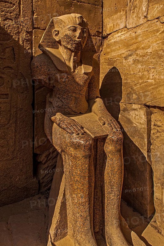 Seated large statue of Thutmosis III on the way to the Temple of Amun