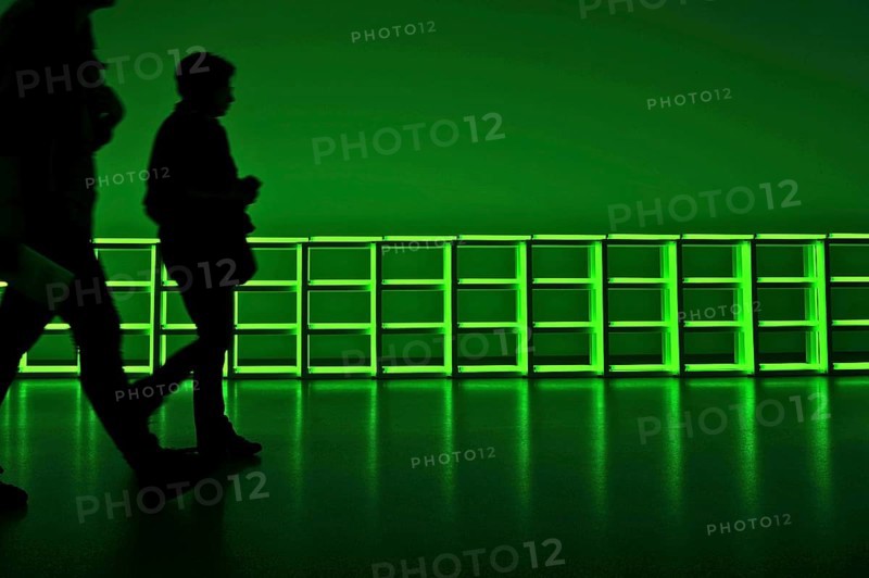 Visitors in front of green light installation in Pinakothek der Moderne