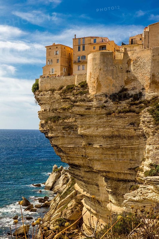 Steep coast of Bonifacio with old town on a limestone plateau