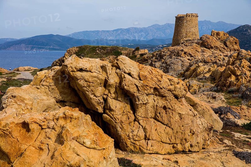 Genoese Tower in L'Ile-Rousse with the offshore island of La Pietra