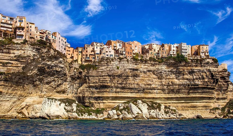 Steep coast of Bonifacio with old town on a limestone plateau