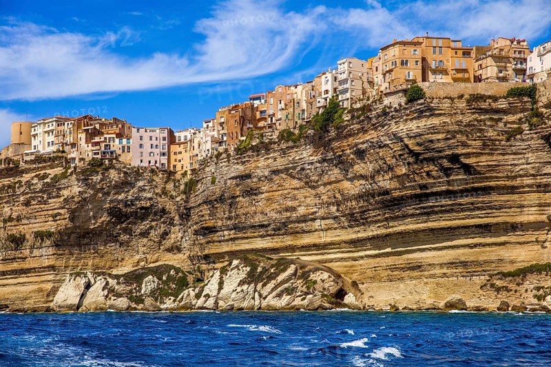 Steep coast of Bonifacio with old town on a limestone plateau