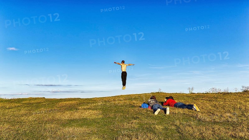 Young people on the edge of a cliff