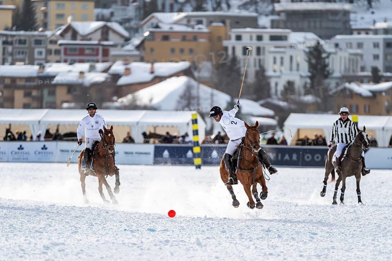 Valentin Novillo Astrada of Team Maserati swings the stick at full gallop for the stroke 36th Snow Polo World Cup St. Moritz 2020