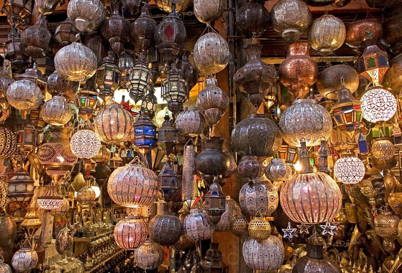 Ornate copper-forged lamps in the souks of Fes