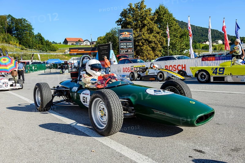 Historic race cars in waiting position