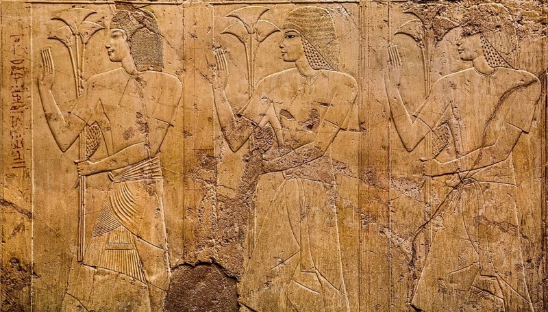 Officials with papyrus stalks