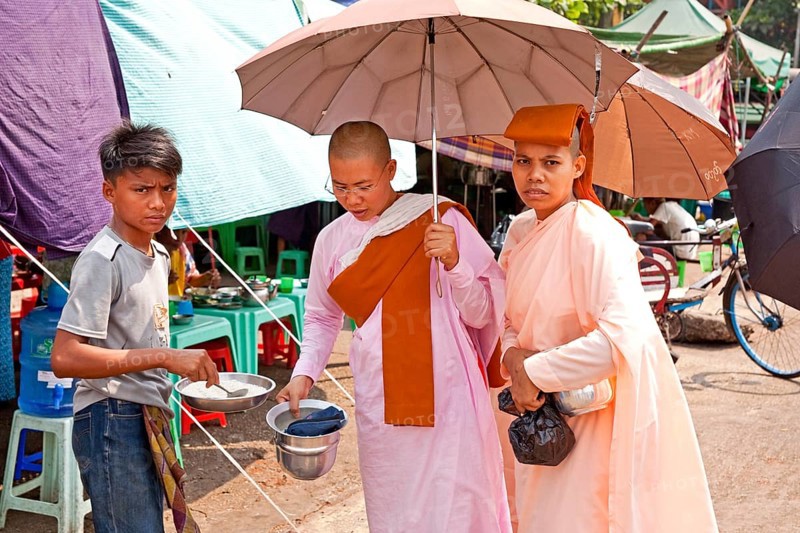 Female monks with begging bowl