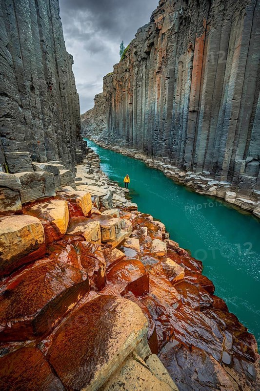 Tourist at Stuolagil Canyon