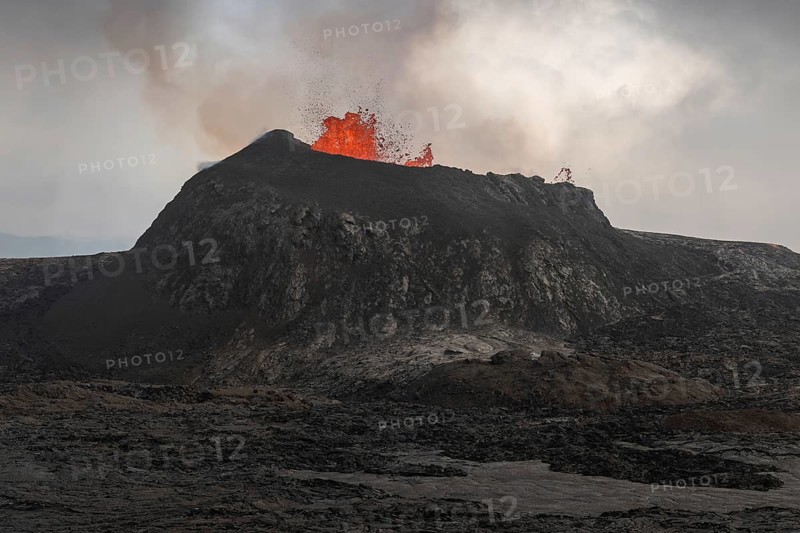 Lava fountain spraying from crater