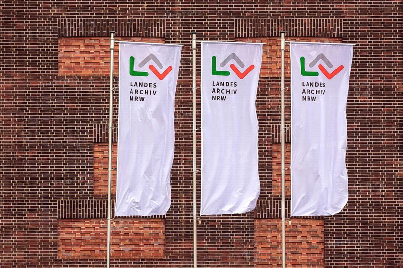 Brick facade with flags