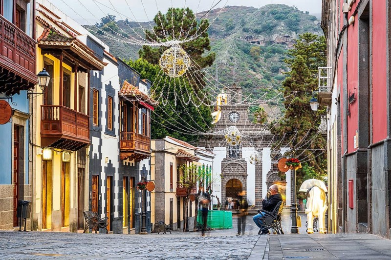 Illuminated main street in historic Teror