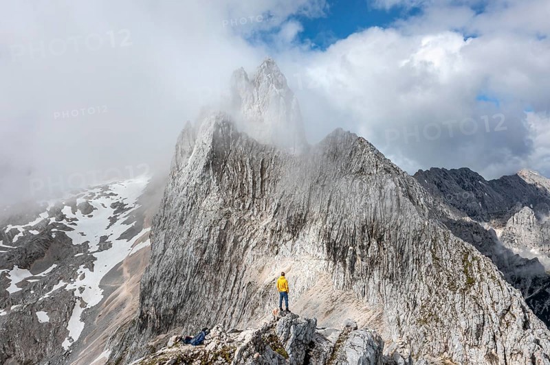 Hiker at the summit of the Westliche Toerlspitze