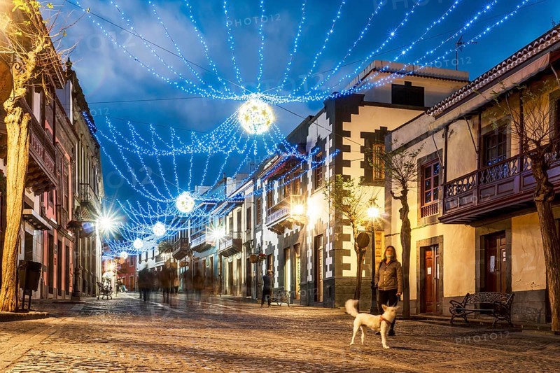 Illuminated main street in historic Teror