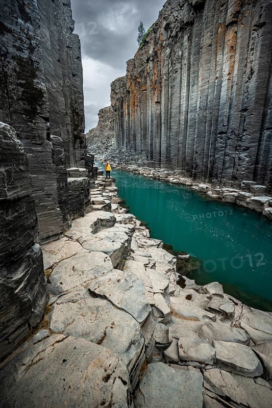 Tourist at Stuolagil Canyon