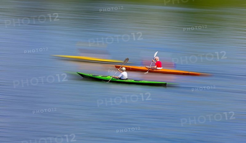 Image editing of canoeists on the Havel