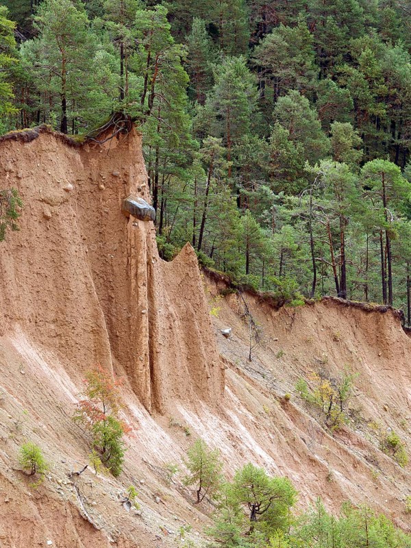 Steep scarp with earth pyramid