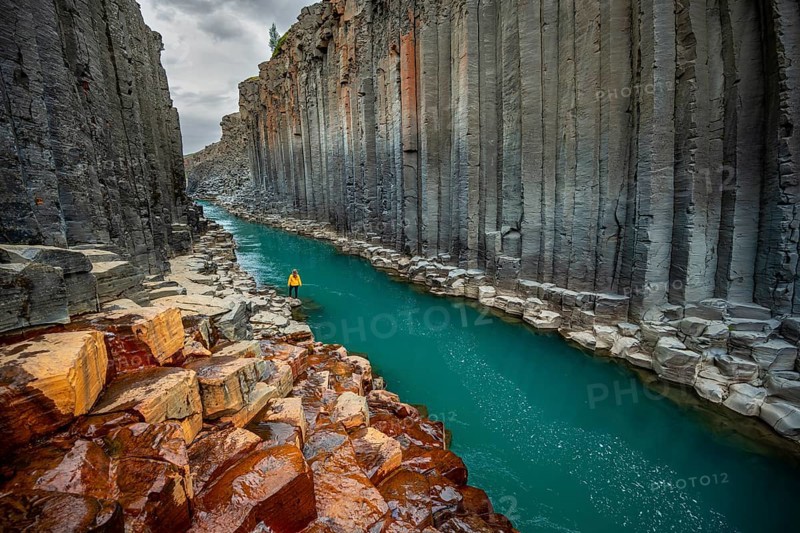 Tourist at Stuolagil Canyon