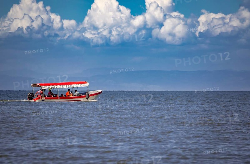 People sailing in a boat on Lake Nicaragua