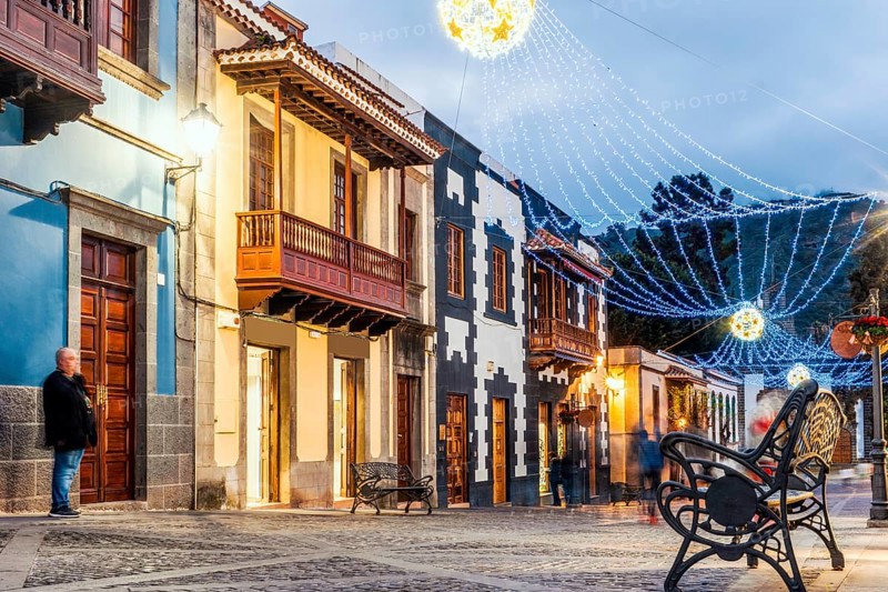 Illuminated main street in historic Teror
