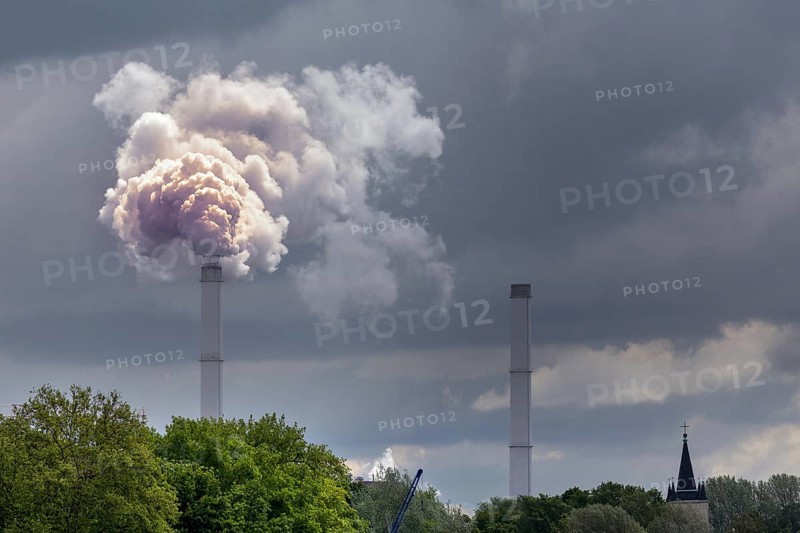 Smoking industrial chimney from Klingenberg power station in Rummelsburg
