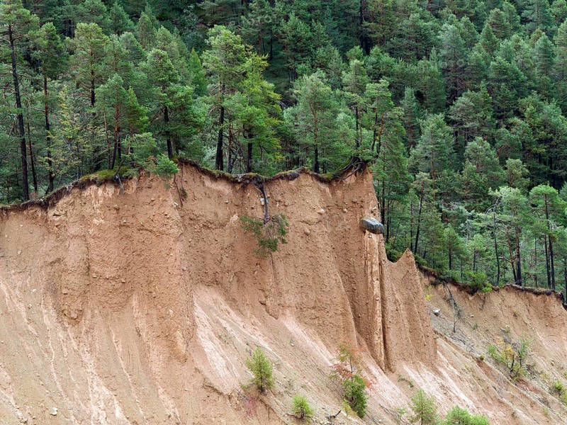 Steep scarp with earth pyramid