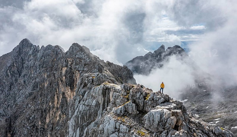 Hiker at the summit of the Westliche Toerlspitze
